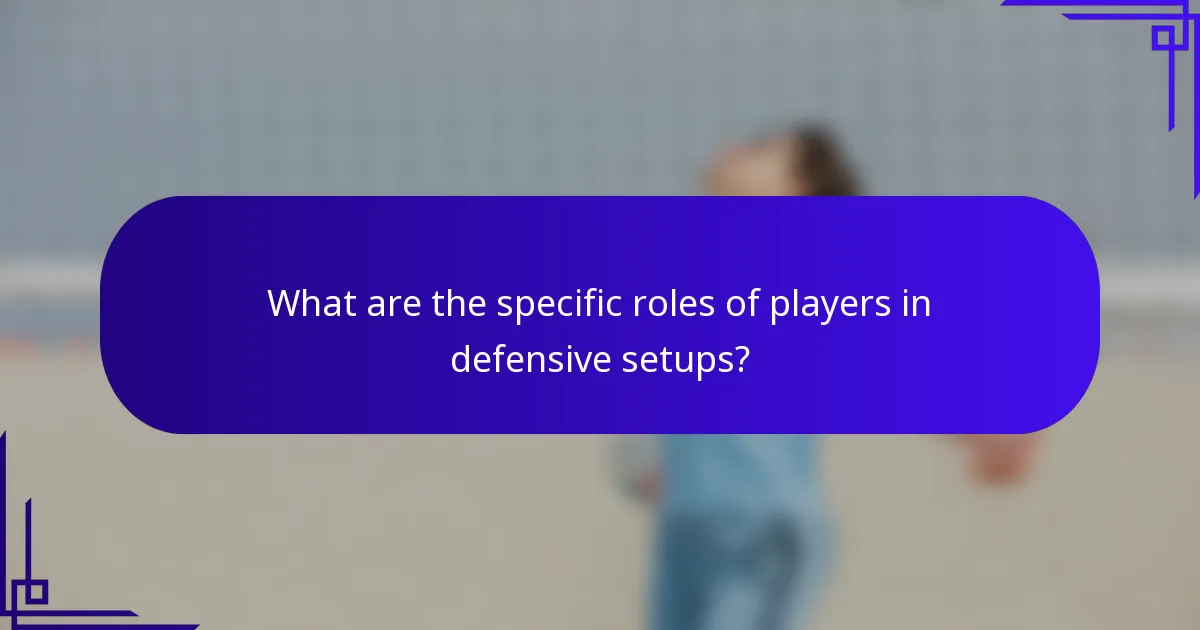 What are the specific roles of players in defensive setups?
